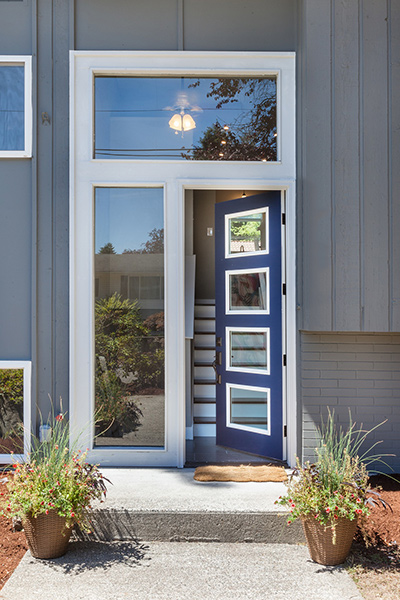 Seaside Park rental open blue franed front door with 4 inset horizontal windows