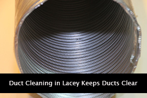 Duct cleaning in Lacey keeps ducts clear in white text on black bar over open aluminum tubing